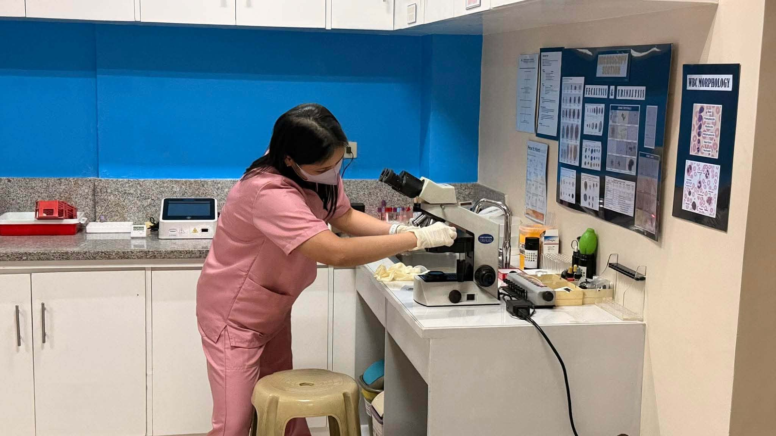 RACHF laboratory staff preparing diagnostic equipment